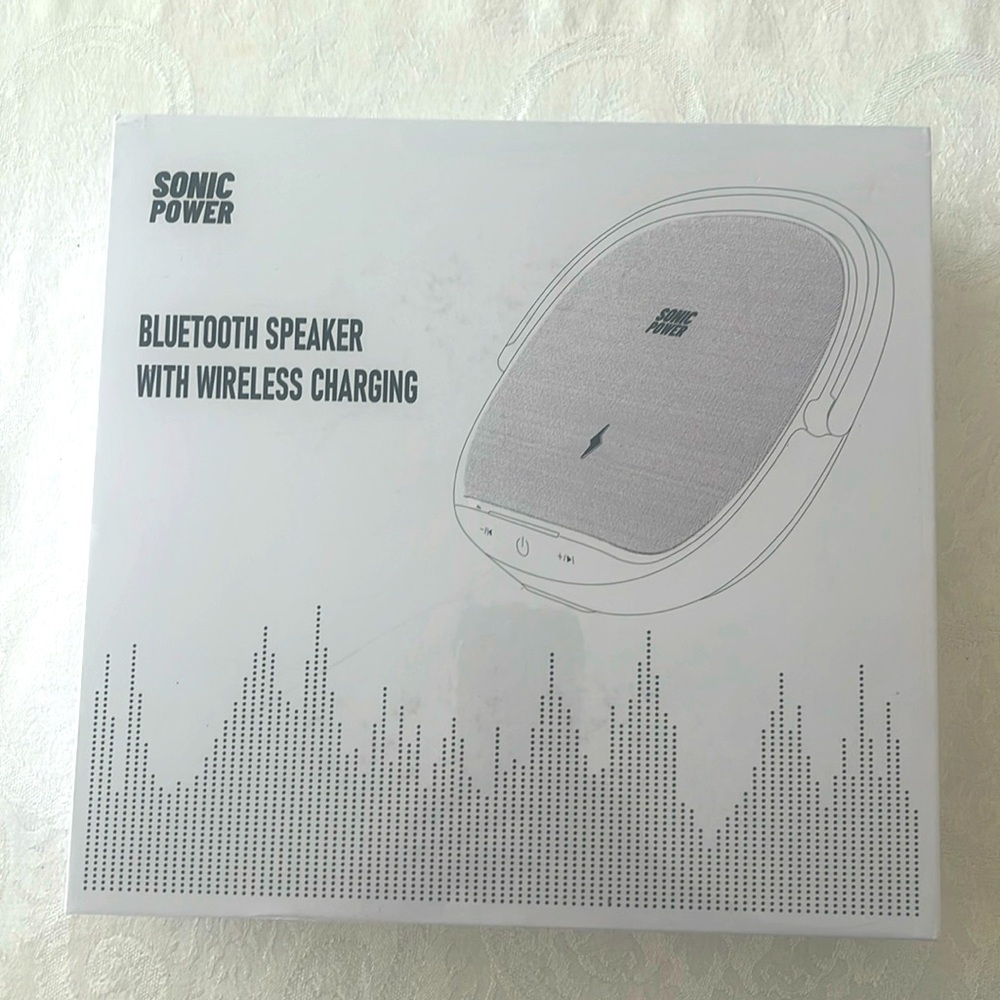 Sonic power, Bluetooth speaker with wireless charger new factory sealed.